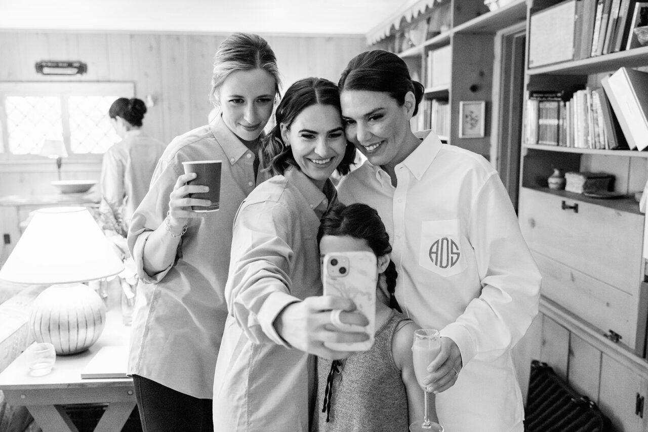 Ladies taking a selfie before wedding