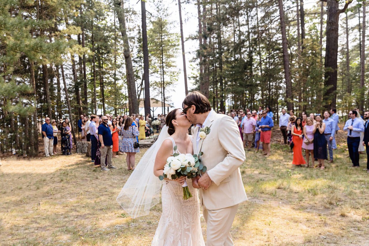 Bride and Groom kissing after ceremony