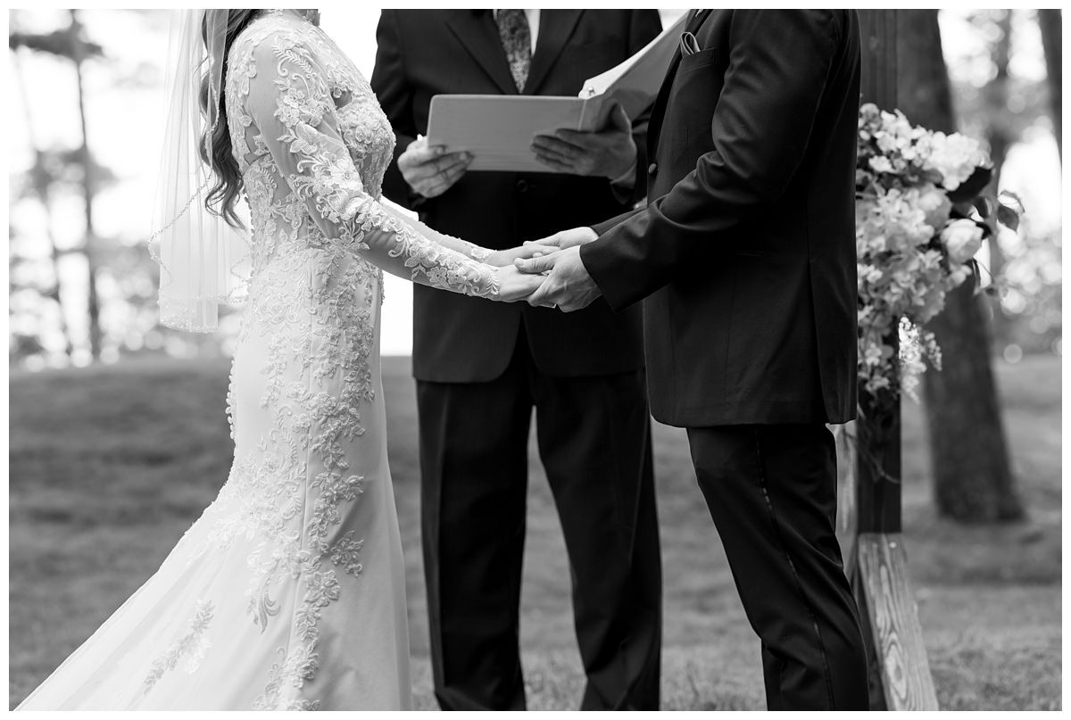 wedding ceremony on front lawn of mission table