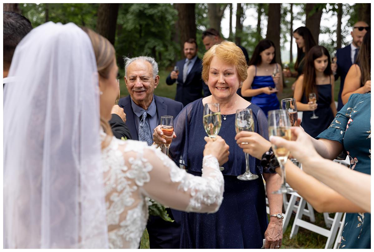 wedding ceremony on front lawn of mission table