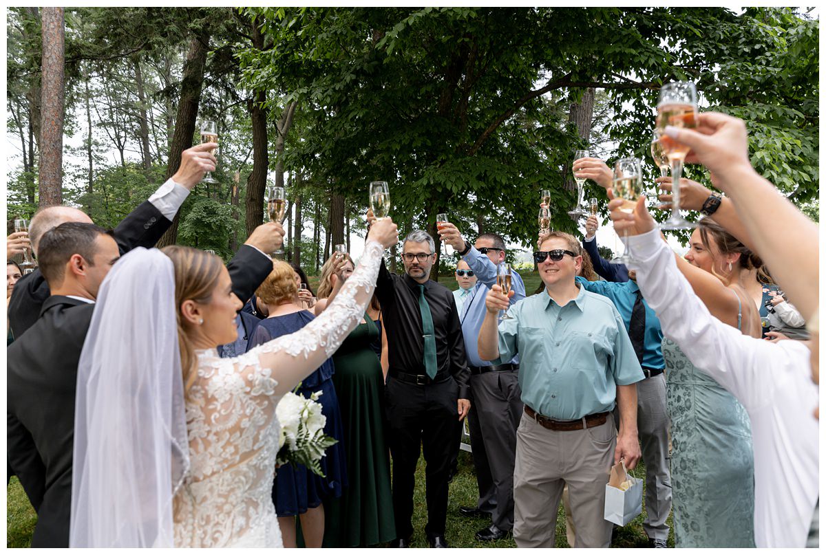 wedding ceremony on front lawn of mission table