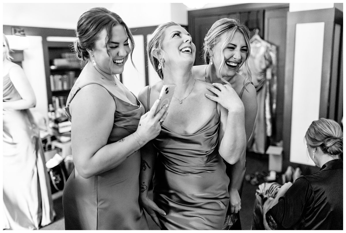 bridesmaids having fun before wedding