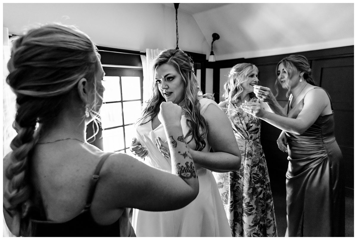 everyone helping bride get ready in traverse city