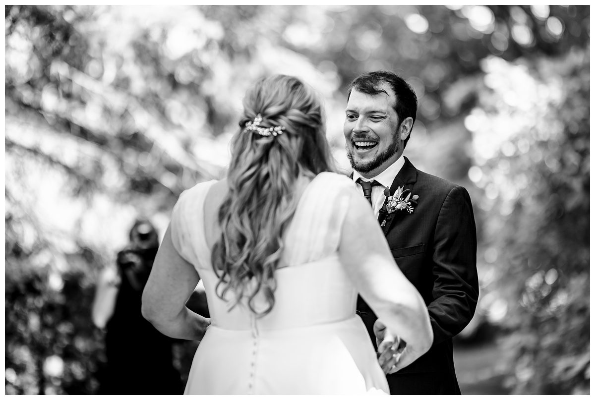 first look with groom at the peninsula room