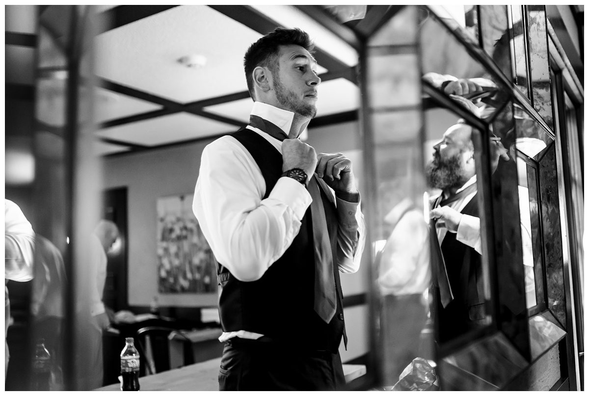 groomsmen getting ready in mission table