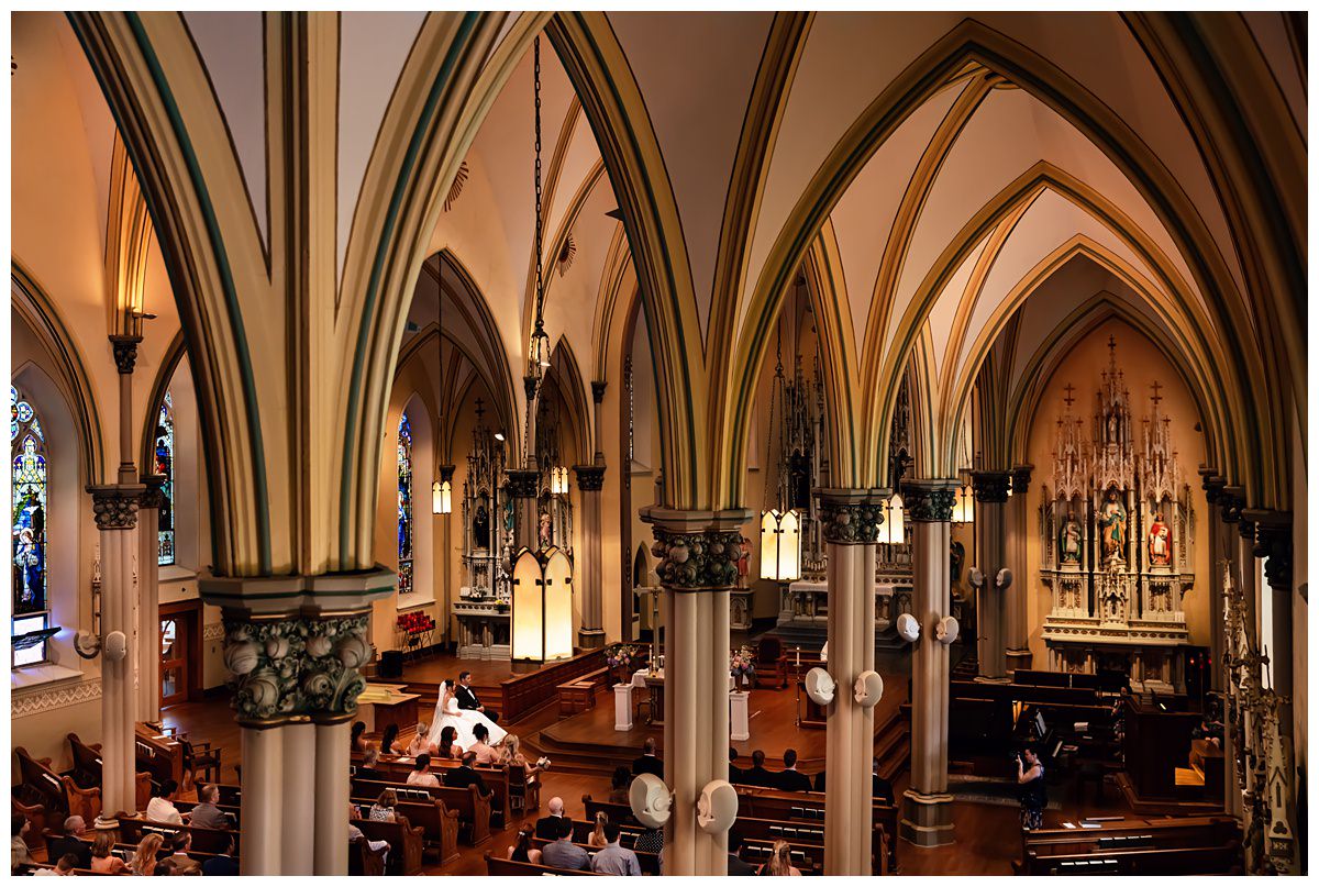 beautiful Catholic Church ceremony with vaulted ceiling