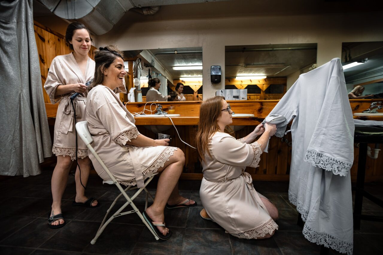 bride getting ready at caberfae peaks