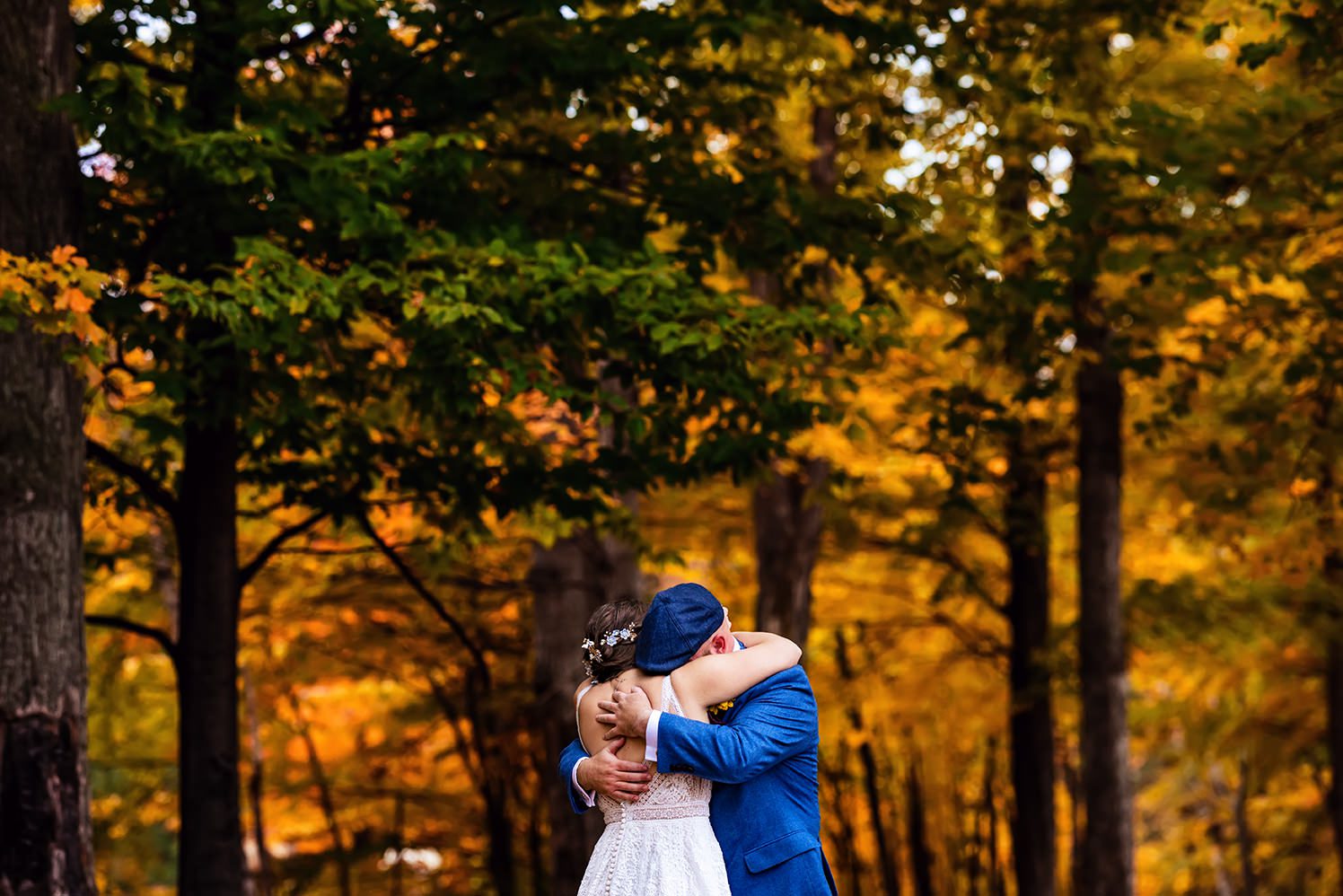 bride and groom during first look in fall