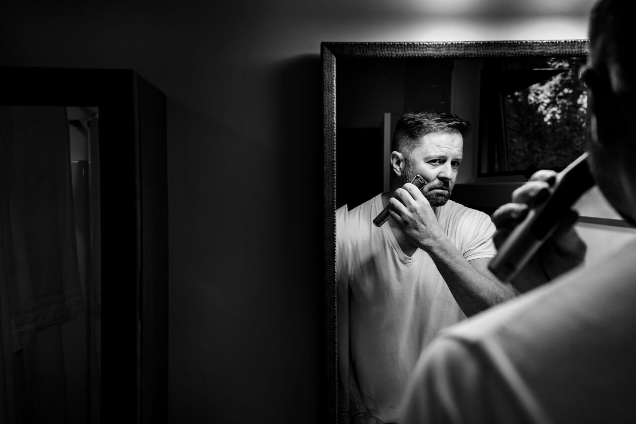 Grooms getting ready for wedding at the Homestead Resort in Glen Arbor