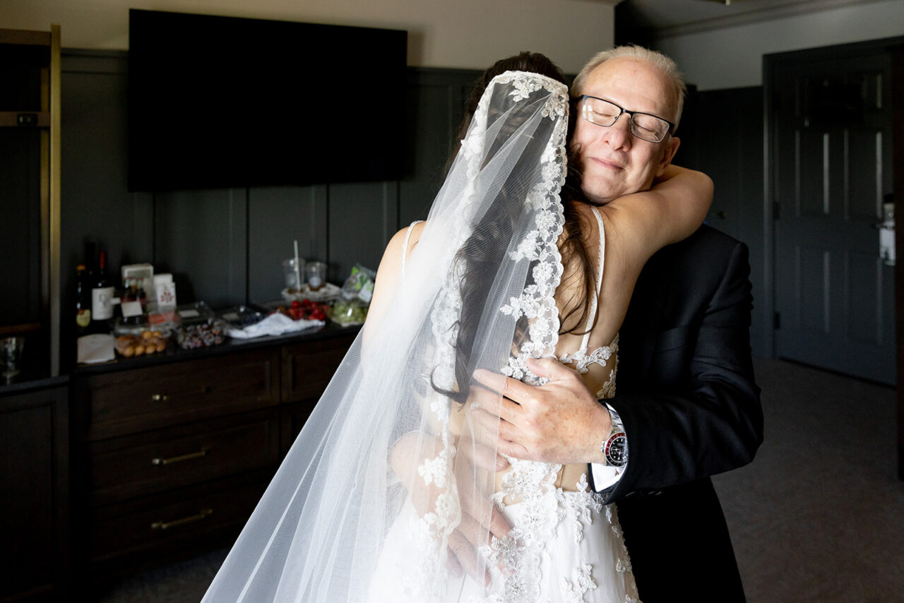 father seeing daughter on wedding day for the first time